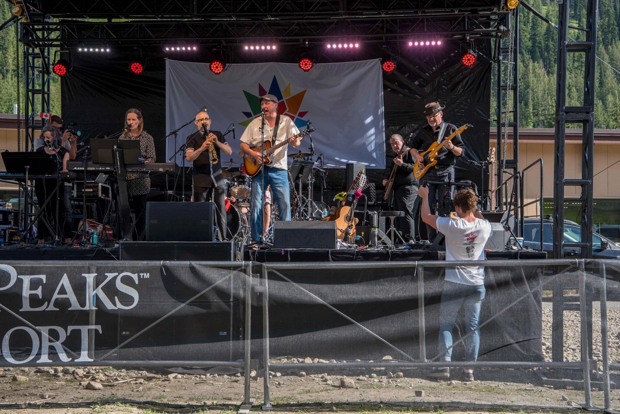 Peter Ernst performing outdoors with his band