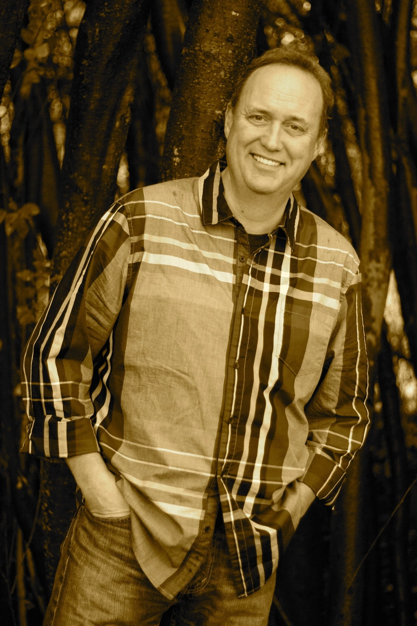 Portrait of Peter Ernst beside a tree